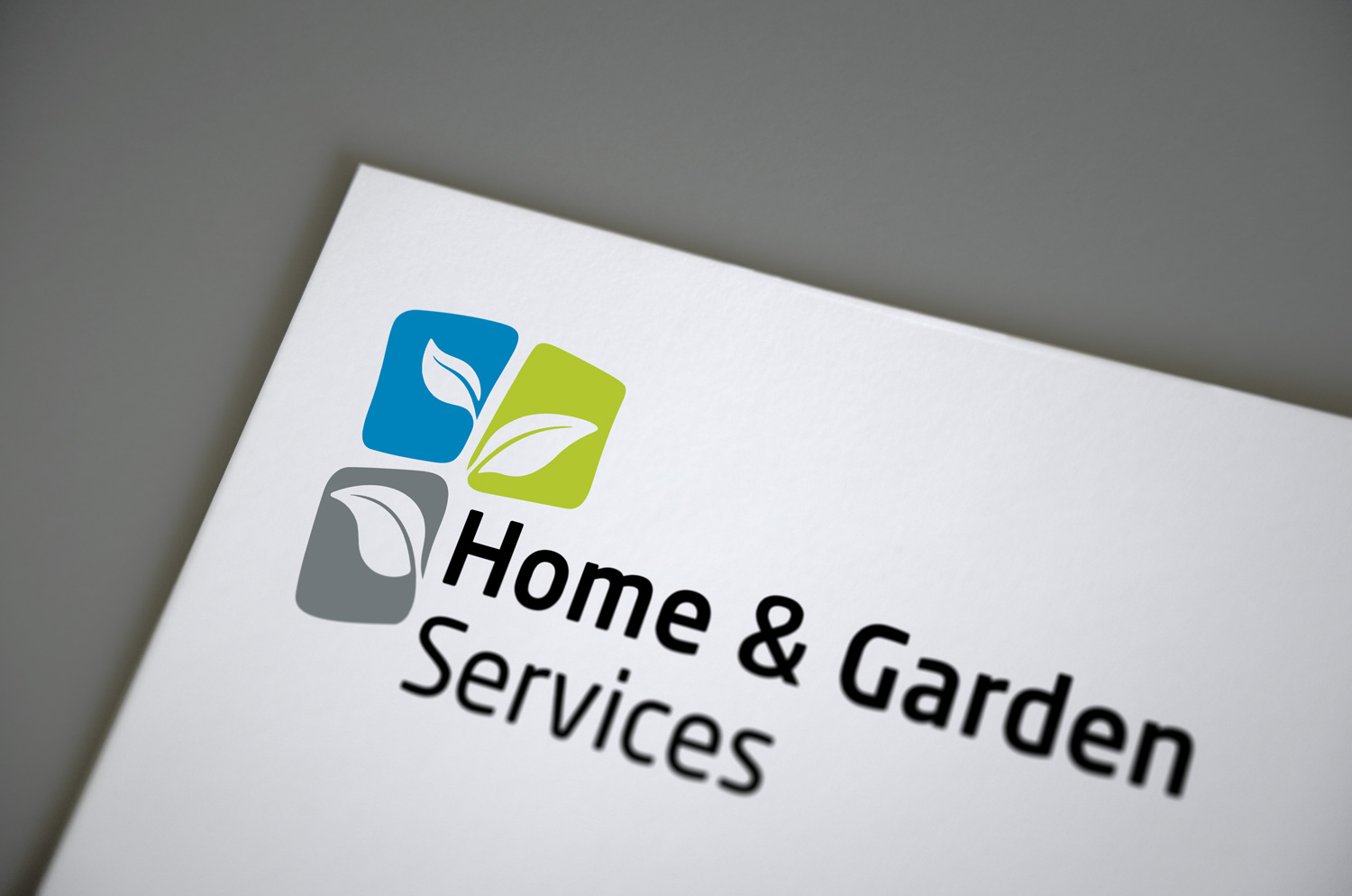Anwendung des Logos von Home and Garden Services auf einem Briefpapier.